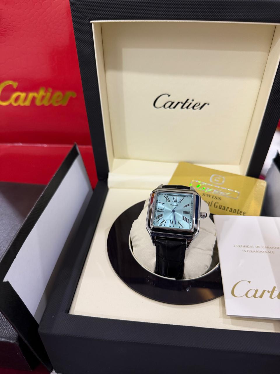 Cartier Santos-Dumont Watch – Silver Case with Light Blue Dial & Black Leather Strap